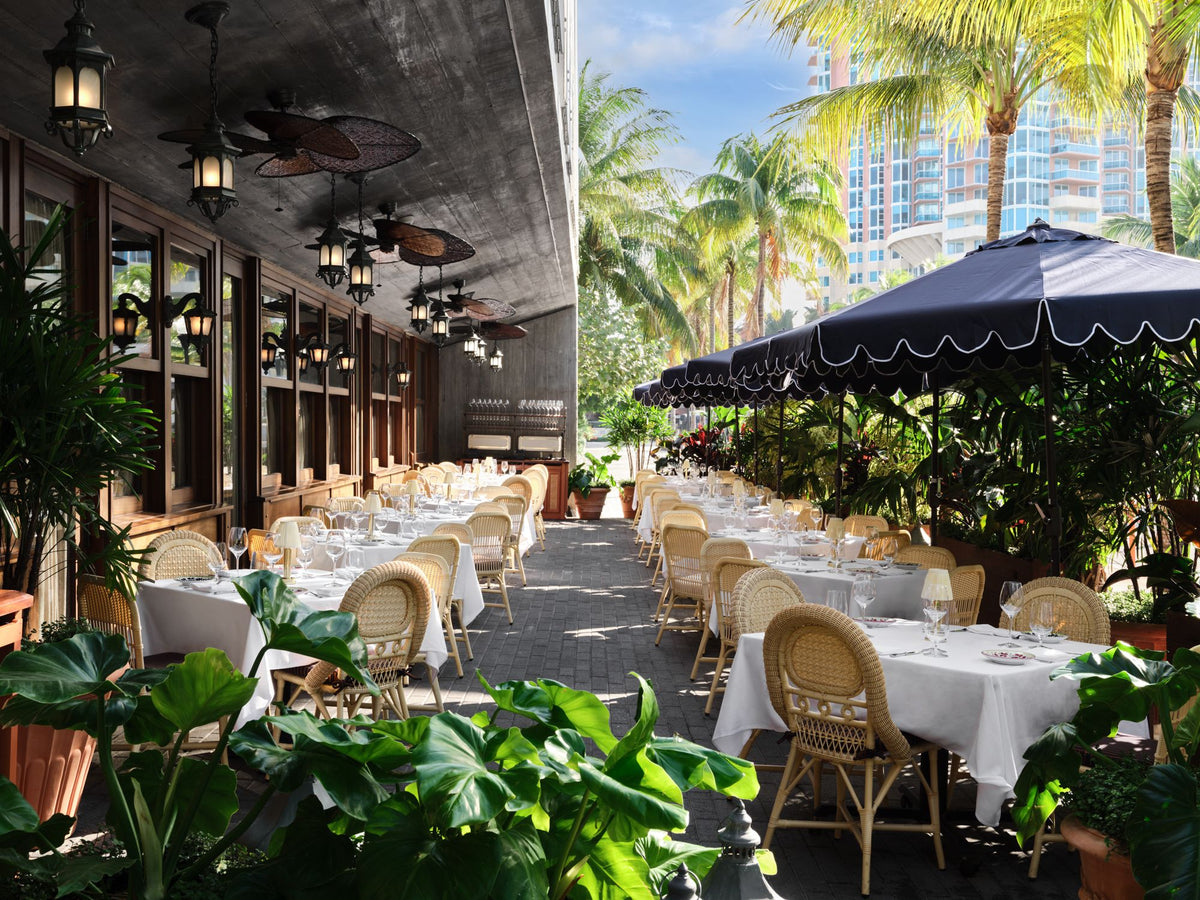 Carbone Miami Beach terrace with tropical plants and palms by Casa Terramar