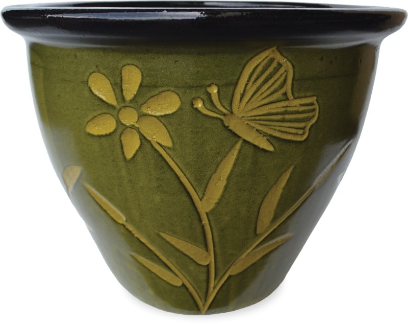 Sol garden planter with butterfly and flower carving, tropical green