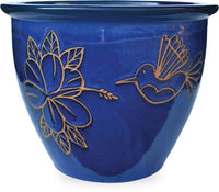 Sol garden planter with hummingbird and hibiscus carving, blue