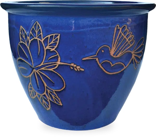 Sol garden planter with hummingbird and hibiscus carving, blue