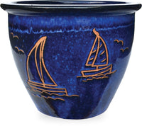 Sol garden planter with sailboat carving, blue