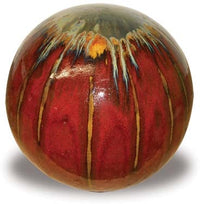 Sol garden sphere, metal on red